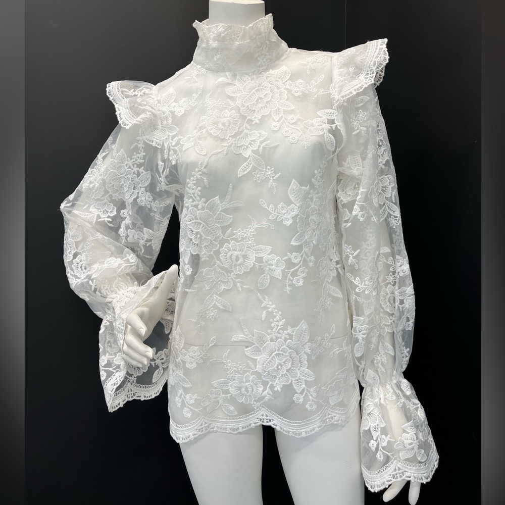 In the Style white lace top.